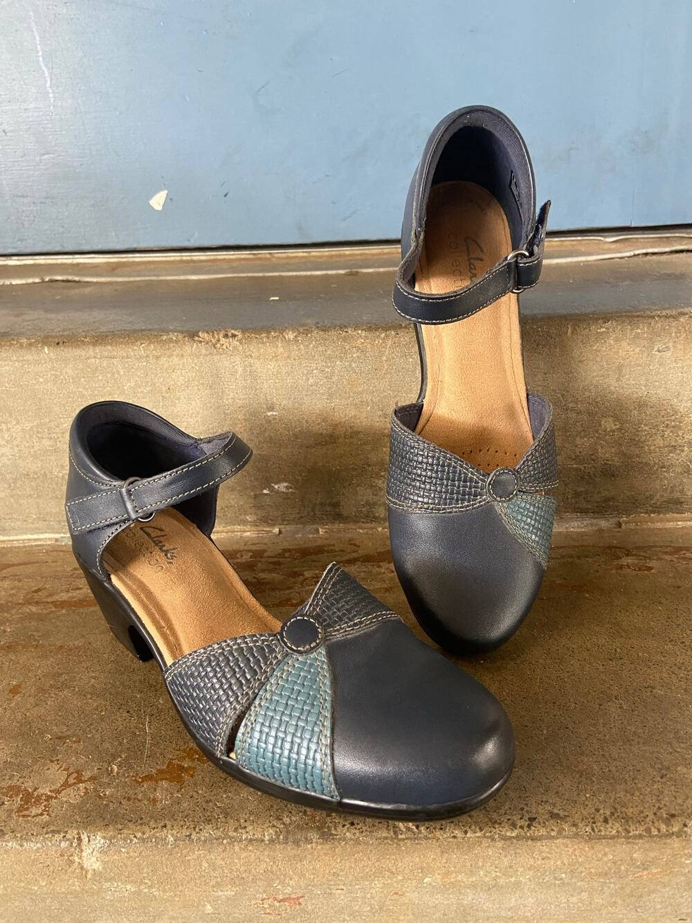 Clarks “Emily Rae” blue combi leather pumps with ankle strap